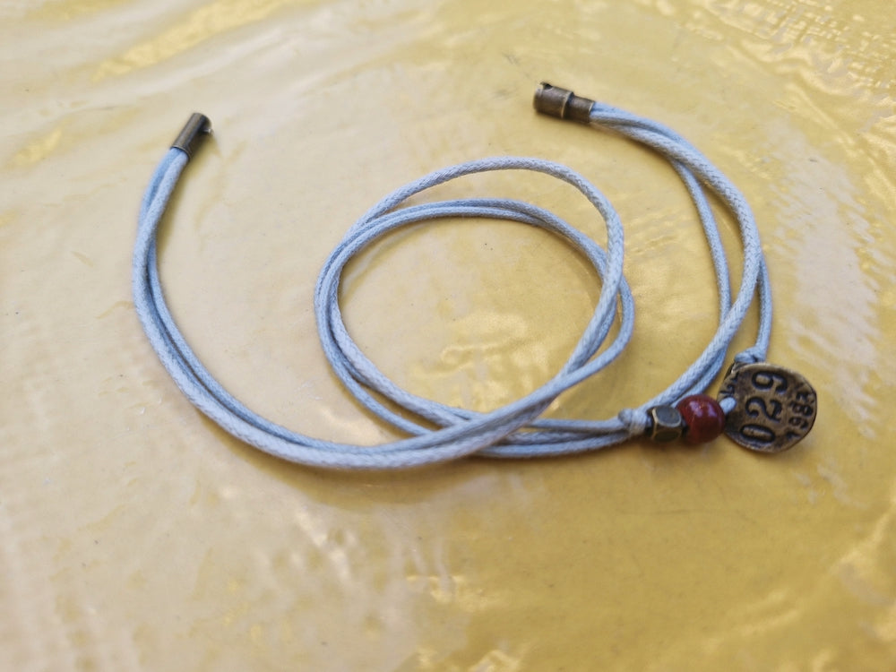 Bracelet in gray, handmade with ceramic beads and magnetic clasp