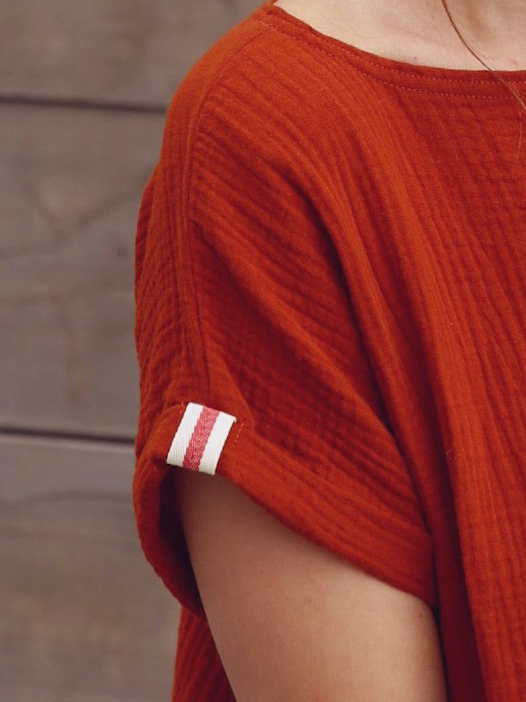 Kleid aus Bio-Musselin, Oversized in Rostrot